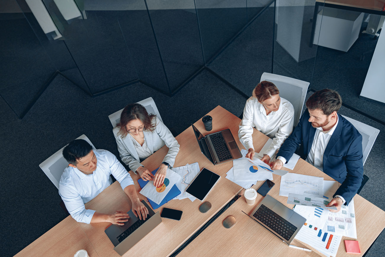 A team working together around a meeting table