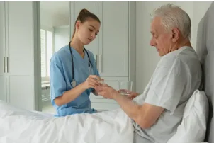 Nurse with an elderly patient