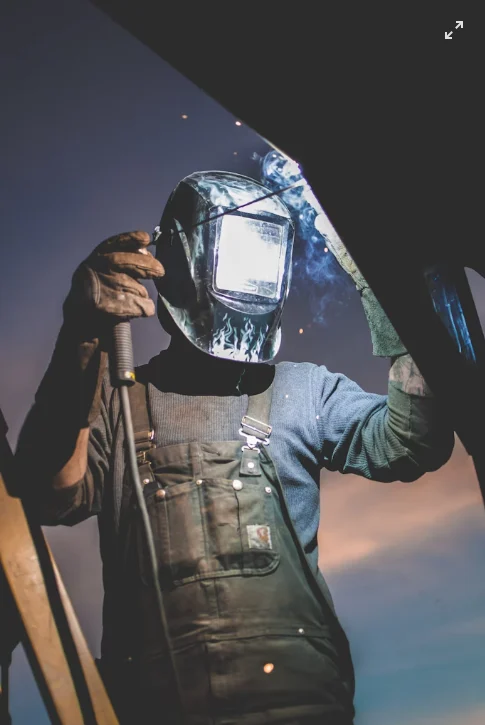 Welder working with a torch
